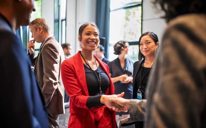 Photo of a group of people meeting at an event